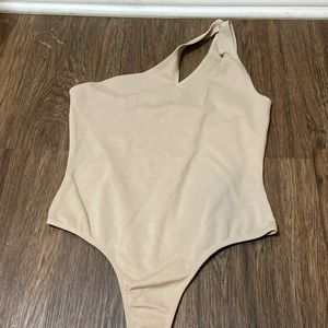 , one shoulder beige bodysuit